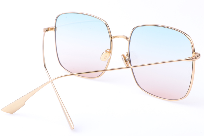 CD Stellaire Sunglasses In Gold Light Blue Pink