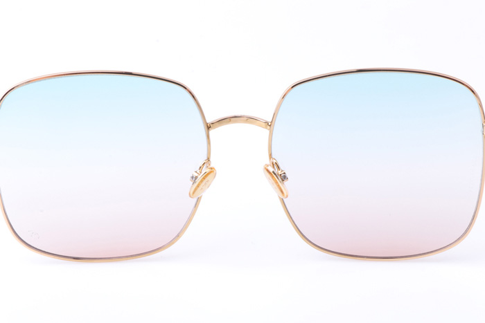 CD Stellaire Sunglasses In Gold Light Blue Pink