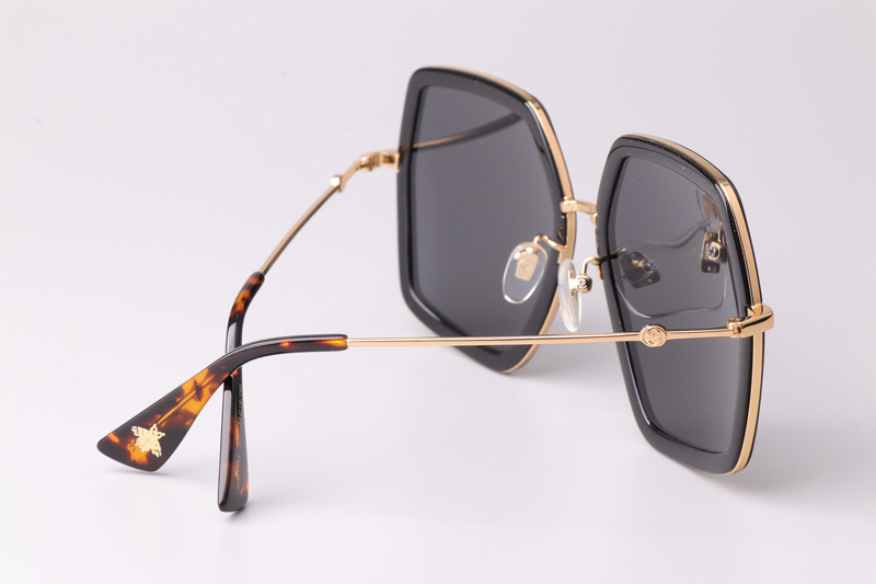 GG0106S Sunglasses Black Gold Gray