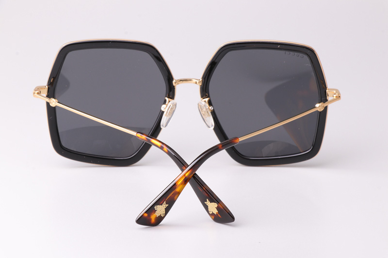 GG0106S Sunglasses Black Gold Gray