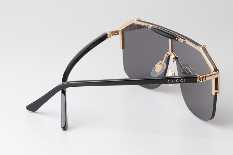 GG0291S Sunglasses Gold Black Gray