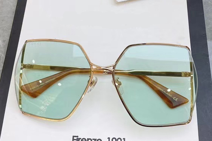 GG0817S Sunglasses In Gold Brown Blue Lens