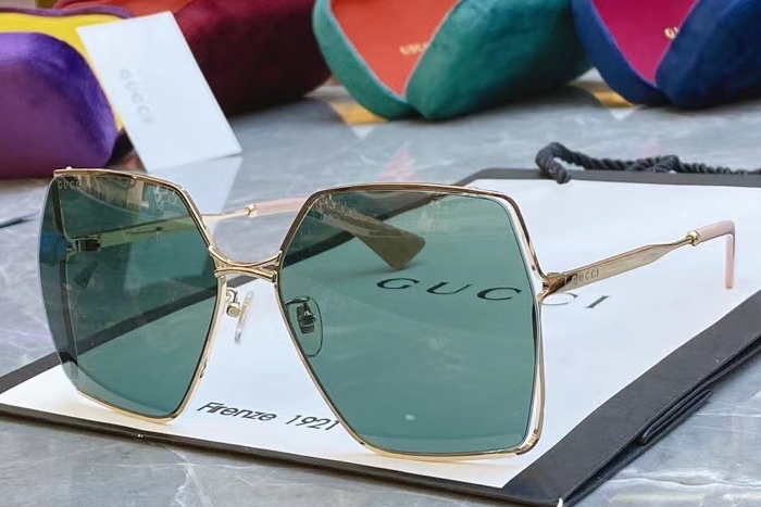 GG0817S Sunglasses In Gold Pink Blue Lens