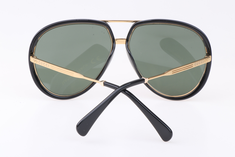 GG0904S Sunglasses In Black Gold Green Lens
