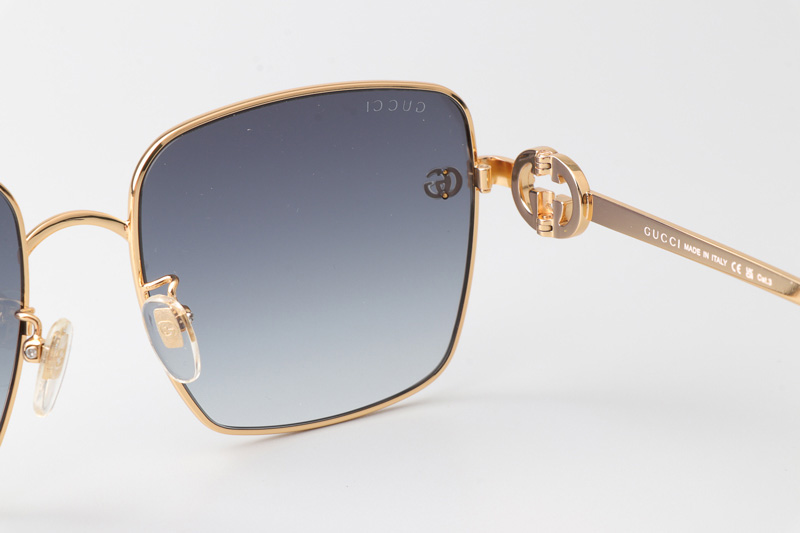 GG1295S Sunglasses Gold Black Gradient Gray