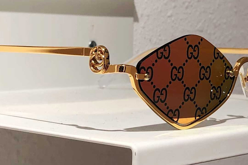 GG1604S Sunglasses Gold Red Logo Flash