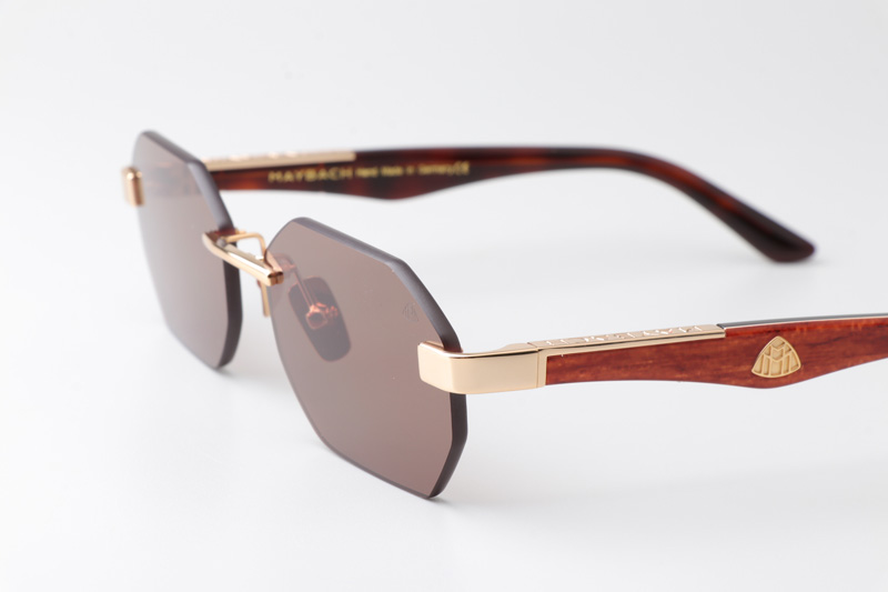 The Aman Sunglasses Gold Red Brown