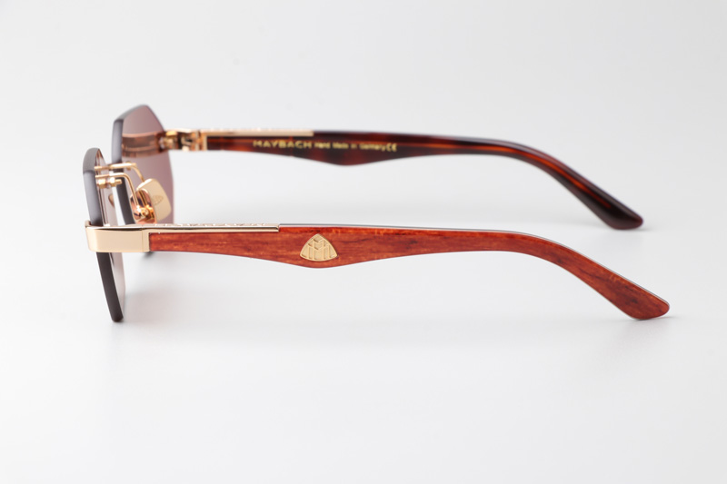 The Aman Sunglasses Gold Red Brown