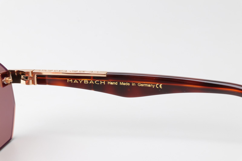 The Aman Sunglasses Gold Red Brown